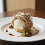 découvrez l'explosion de saveurs de la sphère mont-blanc glacée, une douce harmonie de crème de marrons, meringue croustillante et glace vanille, pour un plaisir gourmand et intense à chaque cuillerée.