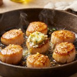 découvrez le secret insoupçonné qui révèle toute la saveur authentique des saint-jacques à la cuisson, pour un plat gourmand et délicieusement parfumé.