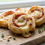 découvrez la recette gourmande des délices roulés au fromage de brebis et jambon fondant, un plat savoureux et facile à préparer pour régaler toute la famille.